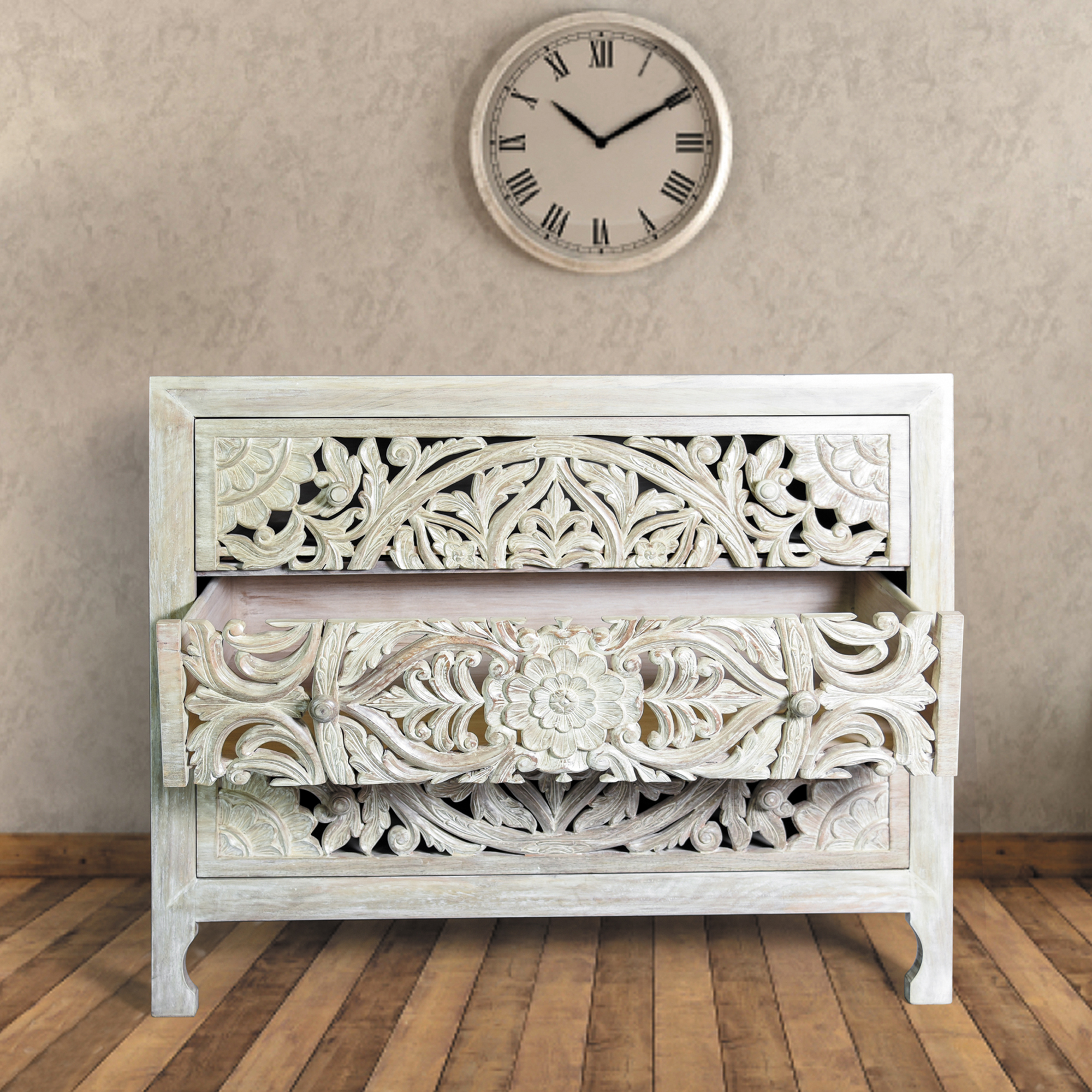 Anthro chest of drawers<abbr> Ghitorni, New Delhi<br>Western hemlock side table with carved floral patterns</abbr>